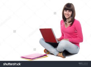 stock-photo-beautiful-young-girl-sitting-on-the-floor-and-using-laptop-116487220